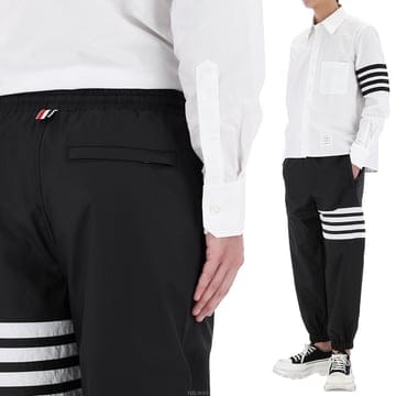 구템즈 26SS 톰브라운 사선 트랙 팬츠 MTU349C F1095 001