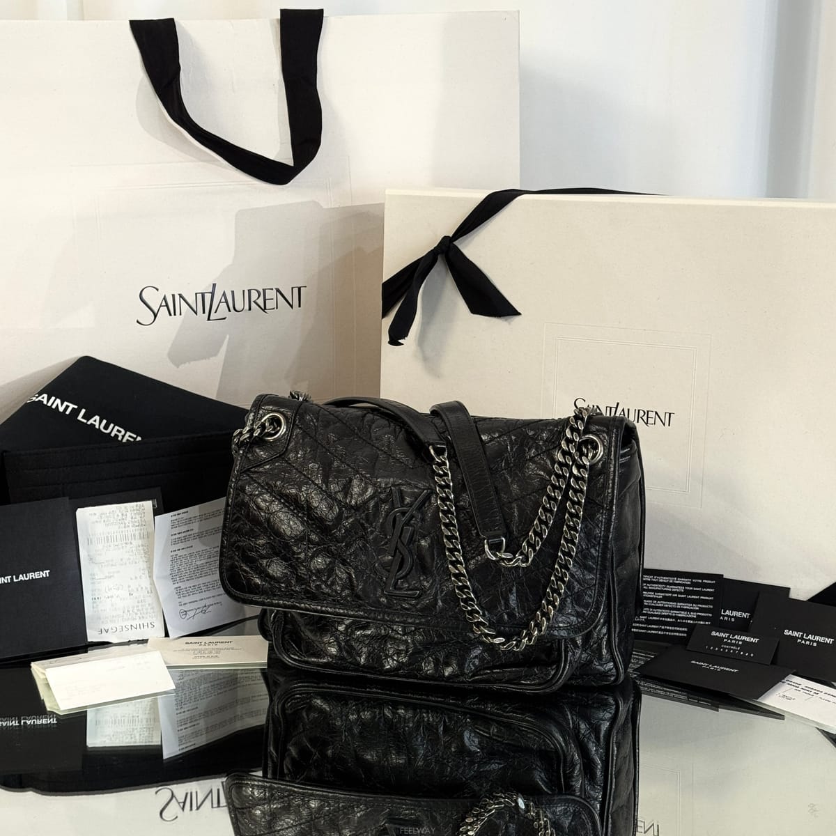 Saint Laurent �Ի��ζ� ��Ű�� �̵�� ���� �����Ի��ζ� ��Ű�� �̵�� ���� ����