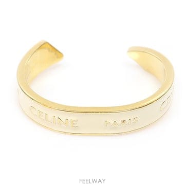 Celine(셀린느) B107C3F68.01IG 아이보리 골드 에나멜 리본 스몰 커프 여성팔찌