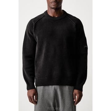 26FW 씨피 컴퍼니 스웨터 21CMKN196A 005558G999 BLACK