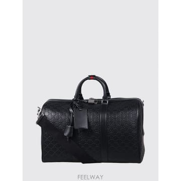 구찌 GG 엠블럼 엠보스드 미디엄 트래블 백 Black leather