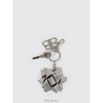 발렌시아가 키 체인 with a shimmering pendant